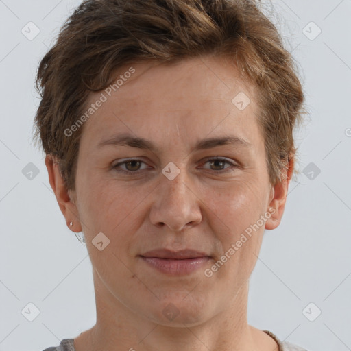 Joyful white adult female with short  brown hair and brown eyes