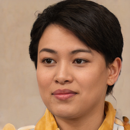 Joyful asian young-adult female with medium  brown hair and brown eyes