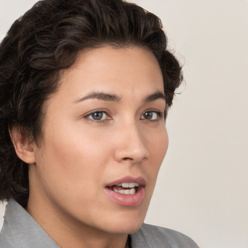 Neutral white young-adult female with short  brown hair and brown eyes