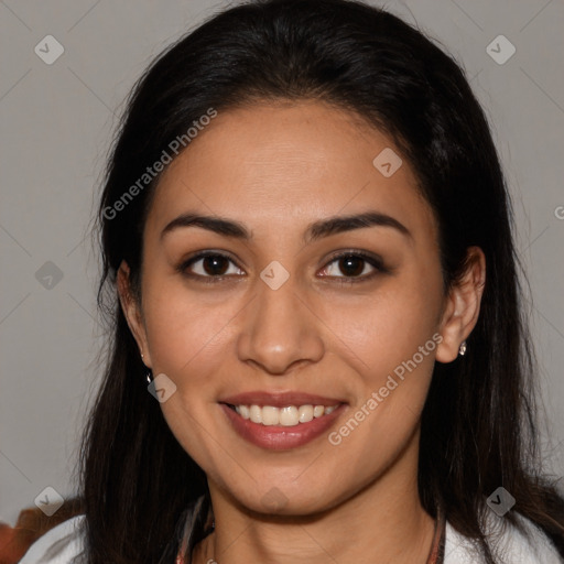 Joyful latino young-adult female with medium  brown hair and brown eyes