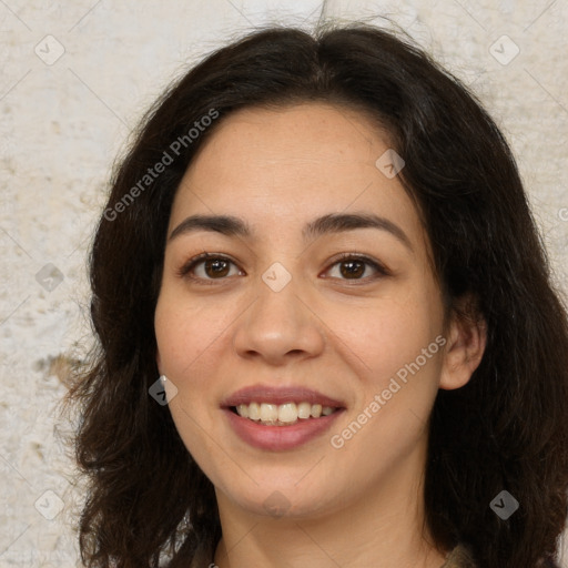 Joyful latino young-adult female with long  brown hair and brown eyes