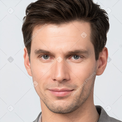 Neutral white young-adult male with short  brown hair and brown eyes