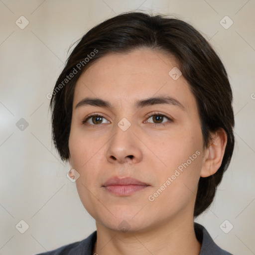 Neutral white young-adult female with medium  brown hair and brown eyes