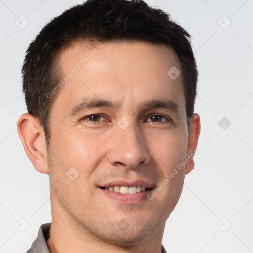 Joyful white adult male with short  brown hair and brown eyes