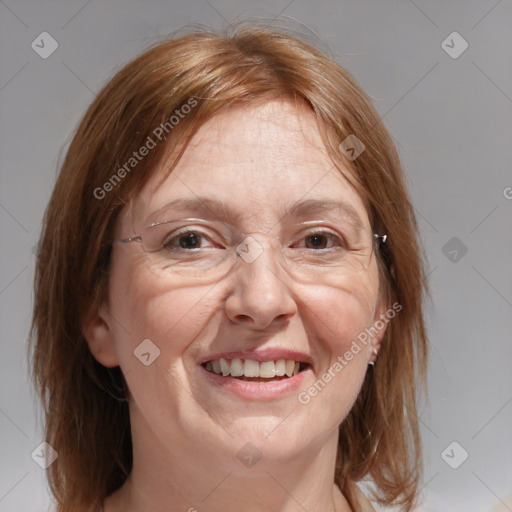 Joyful white adult female with medium  brown hair and blue eyes