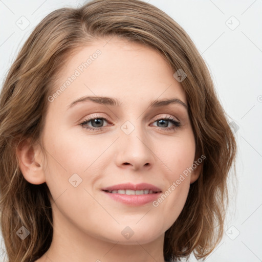 Joyful white young-adult female with long  brown hair and green eyes