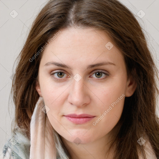 Joyful white young-adult female with long  brown hair and green eyes