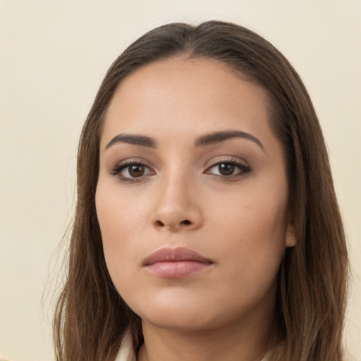 Neutral white young-adult female with long  brown hair and brown eyes