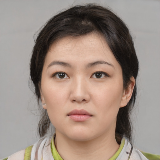 Neutral white young-adult female with medium  brown hair and brown eyes