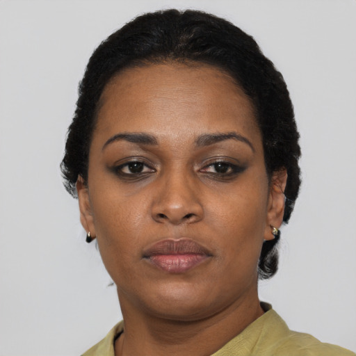 Neutral black adult female with short  black hair and brown eyes