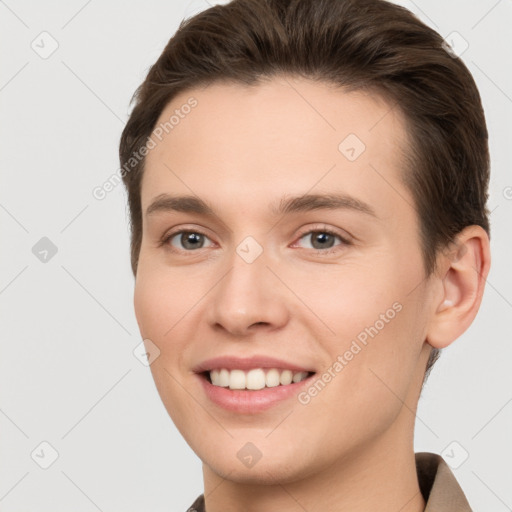 Joyful white young-adult female with short  brown hair and brown eyes