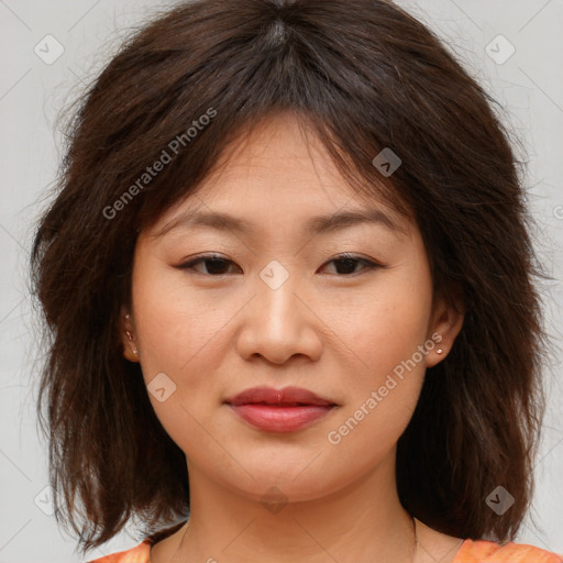 Joyful asian young-adult female with medium  brown hair and brown eyes