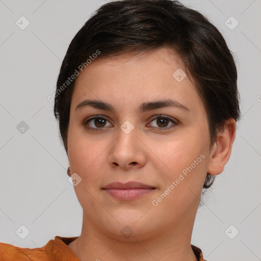 Joyful white young-adult female with short  brown hair and brown eyes