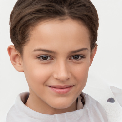 Joyful white child female with short  brown hair and brown eyes