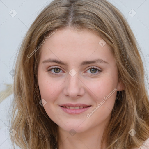 Joyful white young-adult female with medium  brown hair and blue eyes