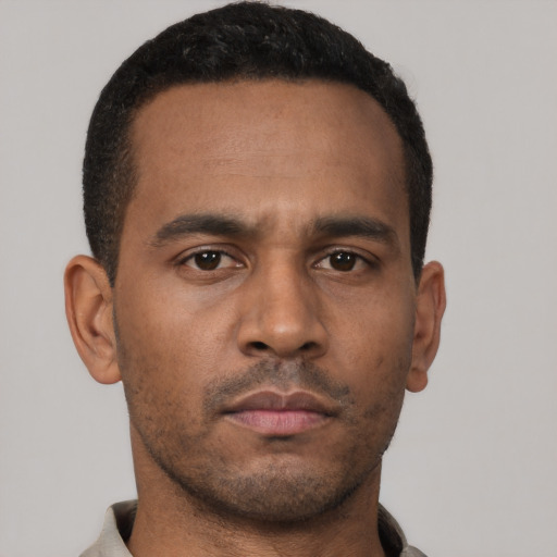 Neutral latino young-adult male with short  brown hair and brown eyes