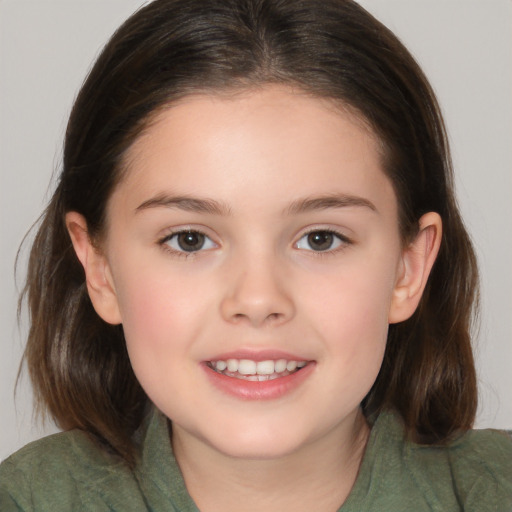 Joyful white child female with medium  brown hair and brown eyes