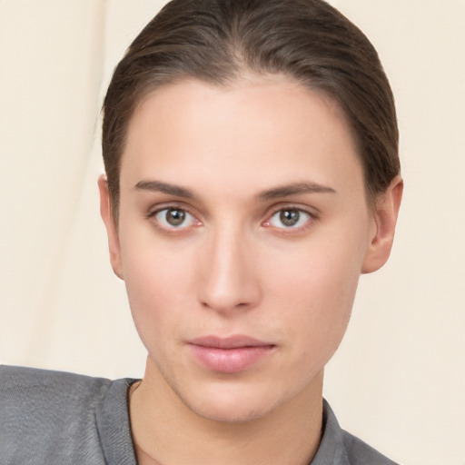 Neutral white young-adult female with short  brown hair and brown eyes