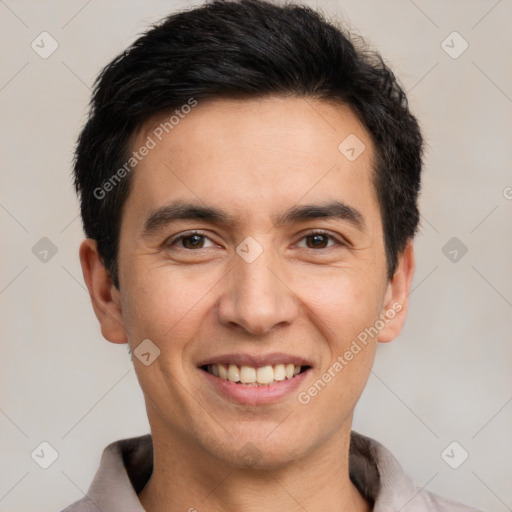 Joyful white young-adult male with short  black hair and brown eyes