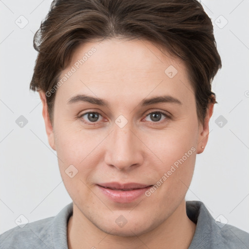 Joyful white young-adult female with short  brown hair and brown eyes