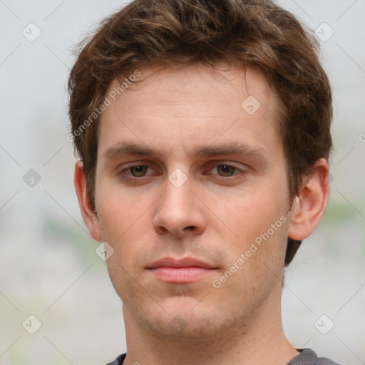 Neutral white young-adult male with short  brown hair and grey eyes