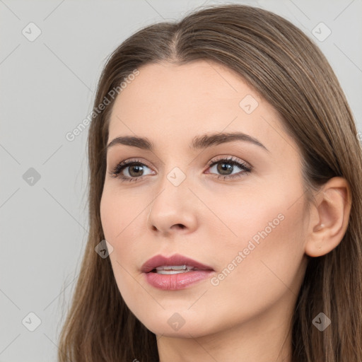 Neutral white young-adult female with long  brown hair and brown eyes