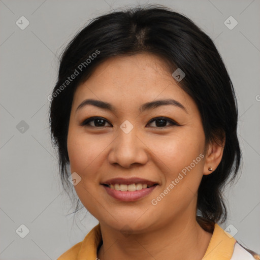 Joyful asian young-adult female with medium  brown hair and brown eyes