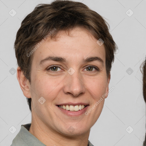 Joyful white adult female with short  brown hair and grey eyes