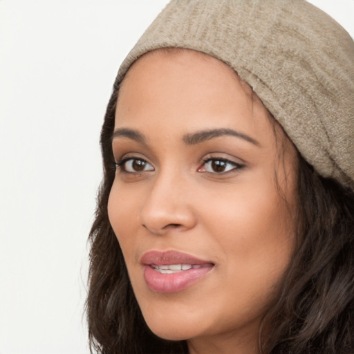 Joyful white young-adult female with long  black hair and brown eyes