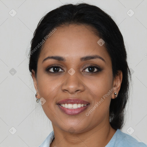 Joyful black young-adult female with medium  black hair and brown eyes