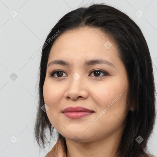 Joyful asian young-adult female with medium  black hair and brown eyes