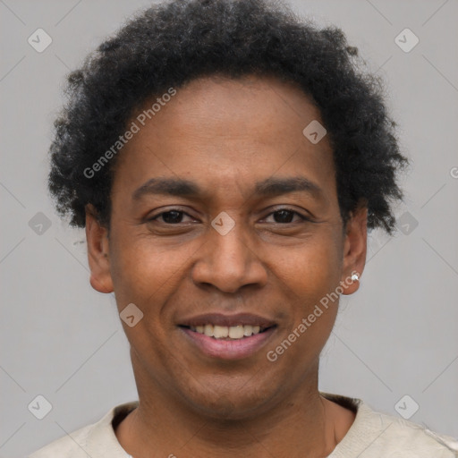 Joyful latino young-adult male with short  brown hair and brown eyes