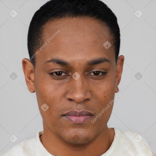 Joyful black young-adult male with short  black hair and brown eyes