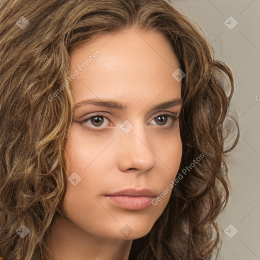 Neutral white young-adult female with long  brown hair and brown eyes