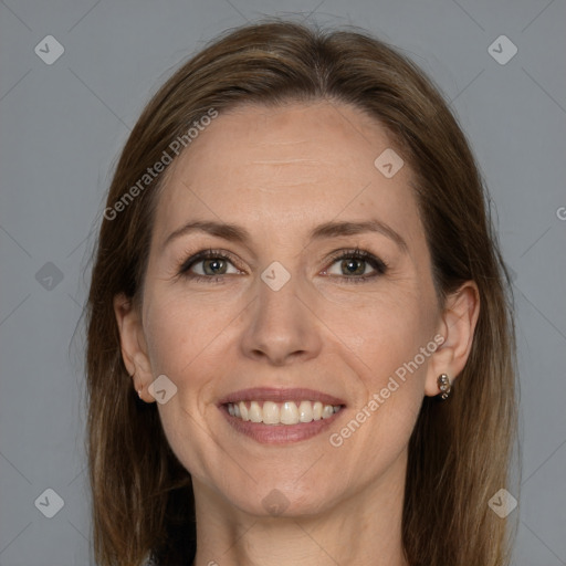 Joyful white adult female with medium  brown hair and grey eyes