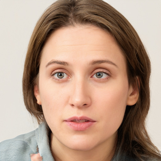 Neutral white young-adult female with medium  brown hair and blue eyes