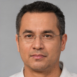 Neutral white adult male with short  brown hair and brown eyes