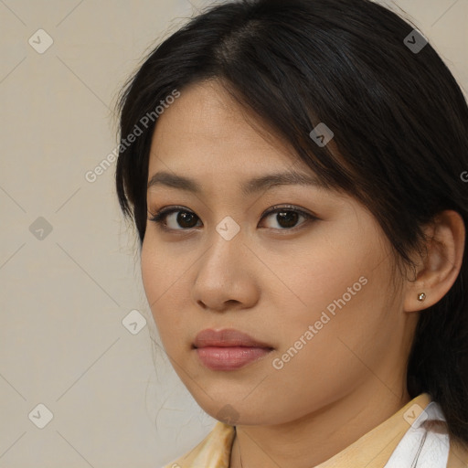 Neutral asian young-adult female with medium  brown hair and brown eyes