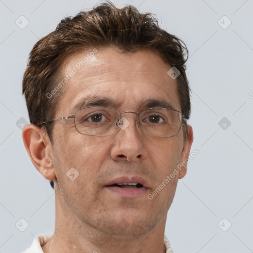 Neutral white adult male with short  brown hair and brown eyes