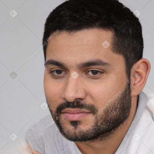 Neutral white young-adult male with short  black hair and brown eyes