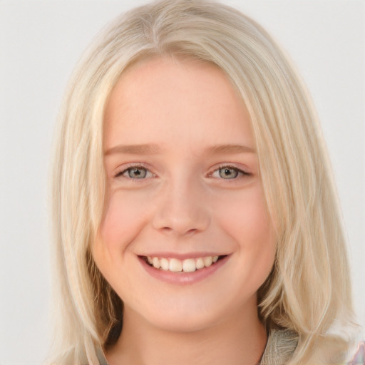 Joyful white young-adult female with long  blond hair and blue eyes