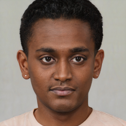 Neutral black young-adult male with short  black hair and brown eyes