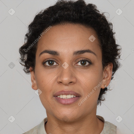 Joyful black young-adult female with short  brown hair and brown eyes