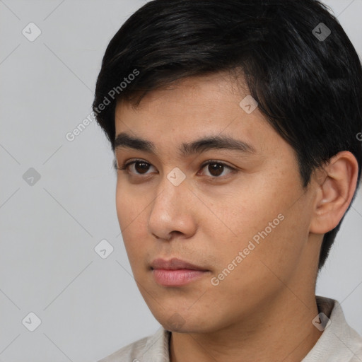 Neutral white young-adult male with short  black hair and brown eyes