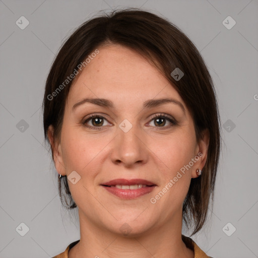 Joyful white young-adult female with medium  brown hair and grey eyes