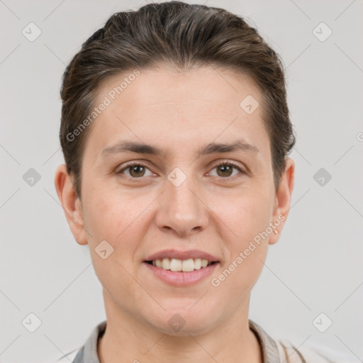 Joyful white young-adult female with short  brown hair and brown eyes