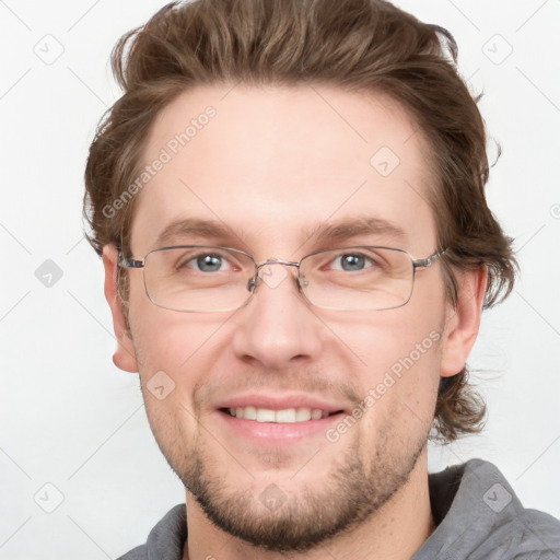 Joyful white adult male with short  brown hair and grey eyes