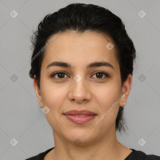 Joyful latino young-adult female with short  brown hair and brown eyes