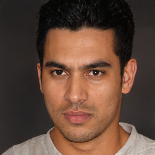 Neutral latino young-adult male with short  black hair and brown eyes