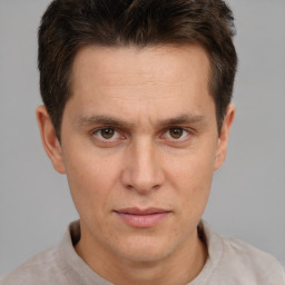 Neutral white adult male with short  brown hair and brown eyes